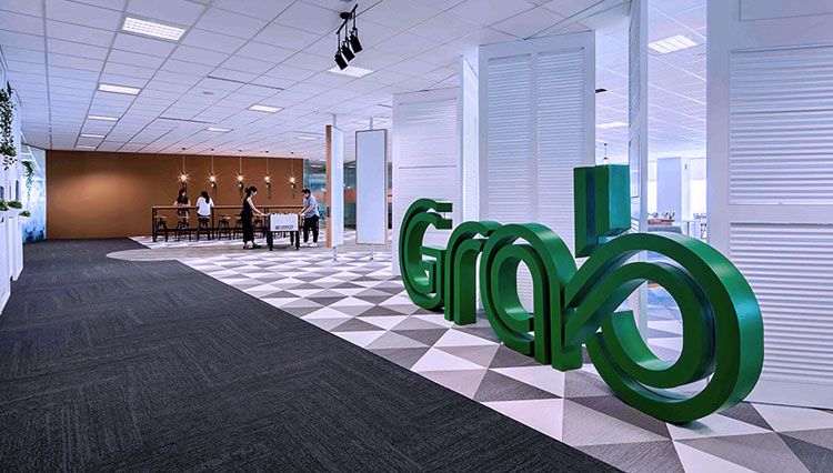 Dukung Kepatuhan Persaingan Usaha, Grab Berkolaborasi dengan KPPU