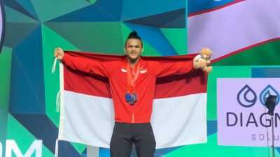 OLIMPIADE PARIS 2024 - Atlet Angkat Besi, Rizki Juniansyah Tambah Perolehan Emas Indonesia