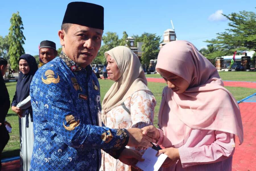 bupati paluta Reski Basyah Harahap RTLH, Guru Mengaji & Penghargaan ASN